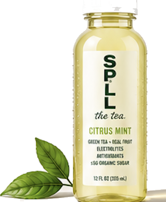 SPILL Citrus Mint bottle with fresh green tea leaves